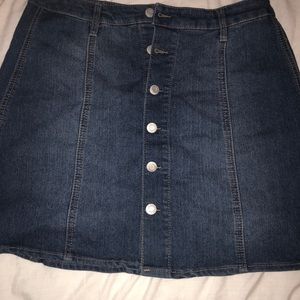 Full button denim skirt. NWOT !! Super trendy